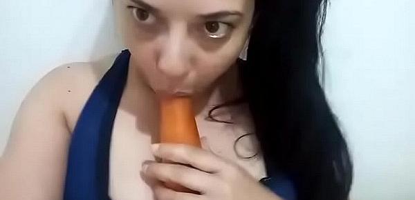  Catherine Osorio playing with carrots